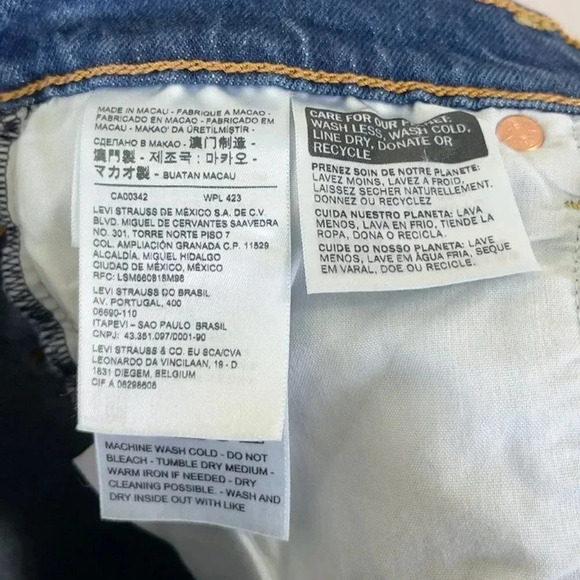 Levi's Ribcage Distressed Mid Thigh Medium Wash Frayed Hem Jean Shorts - Picture 10 of 16